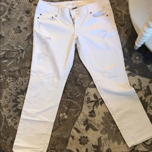 American Eagle white distressed skinny jeans.